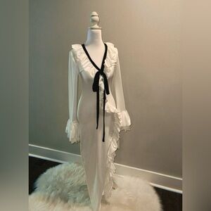 Chic Long Sleeve White Dress with Black Tie Detail